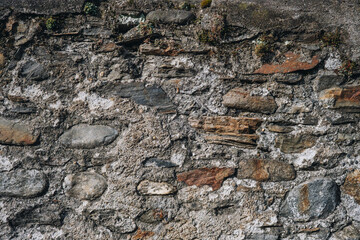 Alte Steinmauer mit Natursteinen.