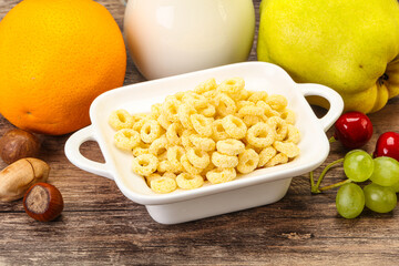 Breakfast with corn rings and milk