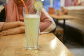 pineapple juice in a bottle on table 