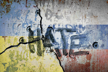 Ukrainian and russian flag painted on concrete wall with the text hate on top. war and conflict...