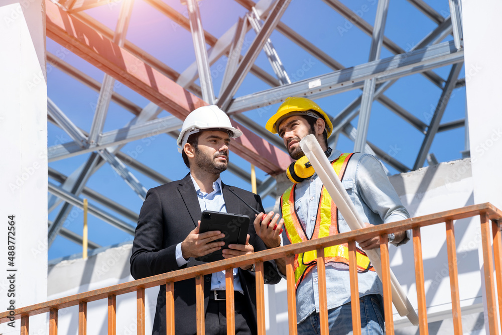 Poster Architect and engineer foreman discussion for plans for new home and working on a building site,Home inspector reviews documents.