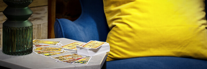 Blurred Tarot cards layout on witch table. Esoteric concept and astrology, Fortune telling tarot...