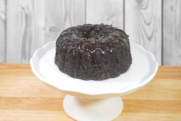 Fudge Chocolate Cake on a White Cake Platter