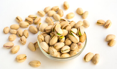roasted pistachios on white background