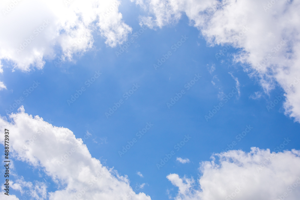 Canvas Prints blue sky and white clouds with empty copy space in the middle center.