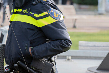 Side View Of A Police Uniform At Amsterdam The Netherlands 5-2-2022 - obrazy, fototapety, plakaty