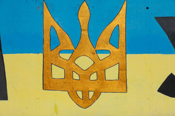 Trident, a Ukrainian symbol graffiti sprayed on a wall in Ukraine