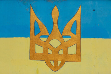 Trident, a Ukrainian symbol graffiti sprayed on a wall in Ukraine