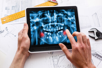 Dentist Office-Digital tablet with a patients x-rays