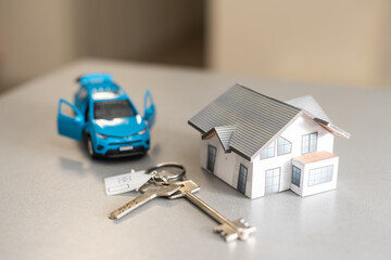 Toy car and keys isolated on white background