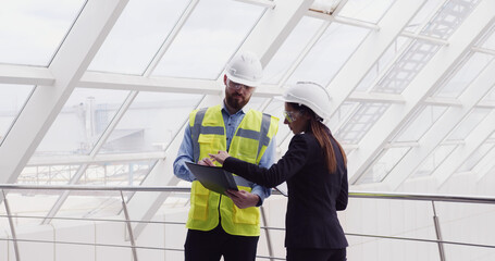 Female human resourses manager talking to company chief male engineer, asking questions about job...