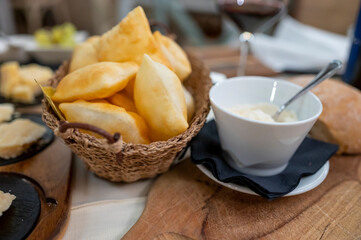 Food of Emilia Romagna region, deep fried bread gnocco fritto or crescentina served in restaurant in Parma, Italy