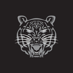 Tiger in black background logo silhouette of abstract tiger head vector illustration