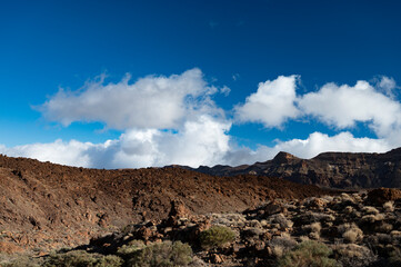 Visiting Teide national park on Tenerife and view on volcanic landscapes, Canary islands, Spain