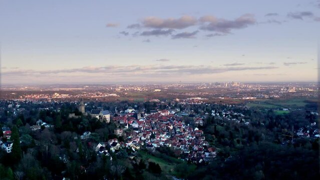 View from Kronberg Taunus over castle to Frankfurt Skyline at horizon on sundawn