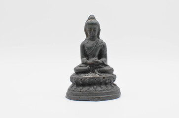 the Buddha.buddha statuette on a white background.meditation. yoga.