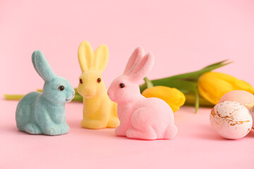 Easter bunnies on pink background