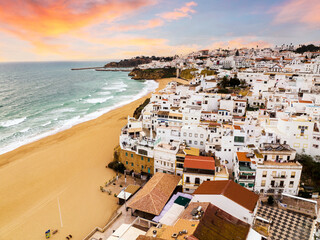 Aerial view of whitewashed architecture of Albufeira by the Atlantic Ocean, Algarve, Portugal