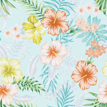 Tropical vintage hibiscus flower, palm leaves floral seamless pattern blue background. Exotic jungle wallpaper.
