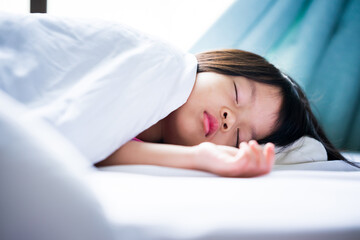 Adorable kid girl sleeping on bed. Child sweet dream. Children sleeping in blanket. Rest during the day. Baby aged 4 years old.