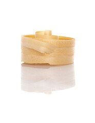 Wood shaving on a white background with reflection. Wood shaving isolated on white background.