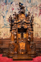 Wooden baroque confessional in the church of Basilica di Santa Maria Maggiore, in Upper Bergamo alta, Lombardy, Italy, Europe - obrazy, fototapety, plakaty