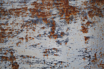 Rusty iron plate texture background with peeled paint