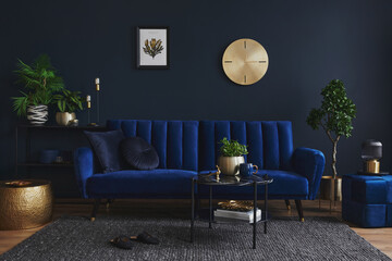 Stylish modern living room interior design with glamour blue sofa, metal shelf, coffee table, pouf...