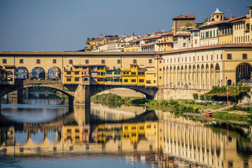 Fototapeta na wymiar view of bridge Ponte Vecchio in Florence, old stone bridge, photo taken from Michelangelo Square, Italy