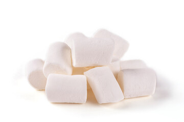 A handful (pile) of sweet marshmallows on a white isolated background.