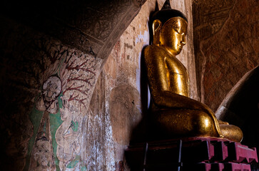 Statue of golden Buddha in temple