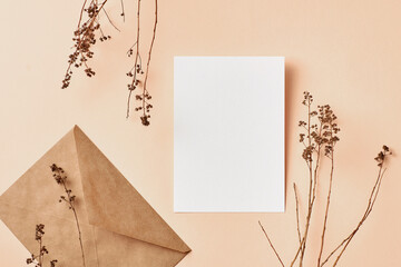 Invitation or greeting card mockup with natural dry twigs decorations