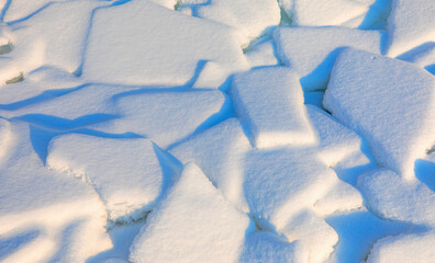 Snow covered with icicles in sunny feb. day - Lake Baikal, Siberia