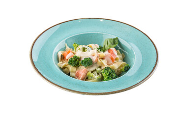 pasta with salmon, broccoli and cream sauce isolated on white background
