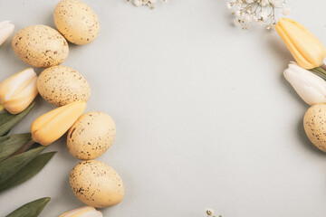 Hand painted pastel colored Easter eggs background. Happy Easter greeting card or invitation.