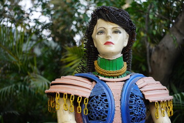Toy doll child, in the park