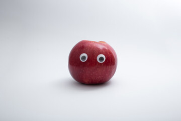 Funny red apples with eyes