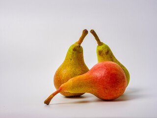 Green pear with a leaf isolated on white. Pear Clipping Path. Professional studio photo