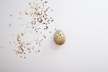 Beautiful quail eggs decorated with flowers and glitter glitter, Easter eggs