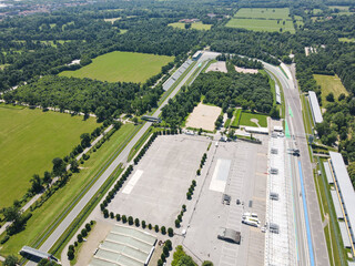 Aerial View of Autodromo Nazionale Monza, that is a race track near the city of Monza in Italy, north of Milan. Venue of the Formula 1 Grand Prix. Epic drone shot in autumn.