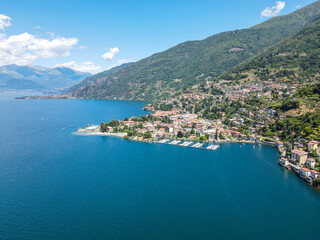 Fototapeta na wymiar Aerial view of Bellano, panoramic view from the drone to the famous old Italy town of Como lake. Near Varenna and Lierna, Bellano is a small town in Como, near Lecco, in Lombardia.