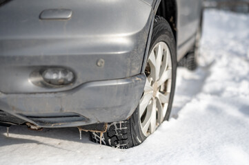 wheel in deep winter snow snowbank