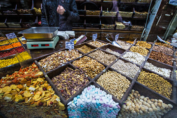 Spices, nuts and sweets shop on the market in Amman downtown, Jordan. Choice of Arabic spices on the Middle East bazaar, Jordan