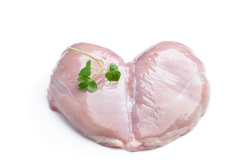 Raw chicken breast with parsley leaves isolated on white