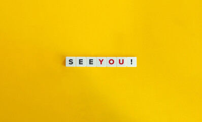 See You Phrase on Letter Tiles on Yellow Background. Minimal Aesthetics.