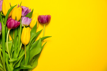 Greeting card mockup with colorful tulips. Easter,mother's day,women's day etc.Top view. Copyspace banner