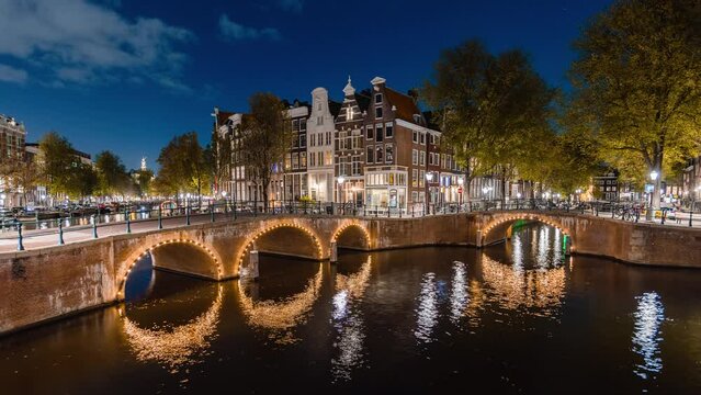 Night Time Lapse with clouds and boats in Amsterdam, The Netherlands