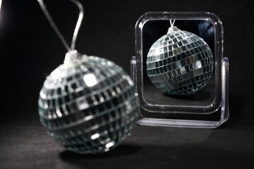 Disco ball with colored flash foils photographed in the studio