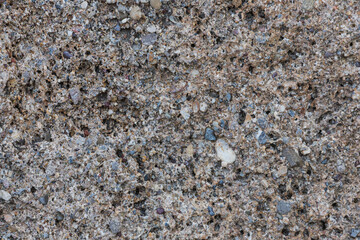 Background of brown-gray stone wall  . Pattern of slate wall texture and background
