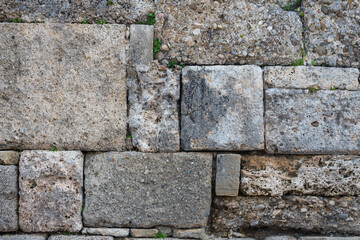 The texture of the stone wall. Background texture of the stone wall of the old castle.